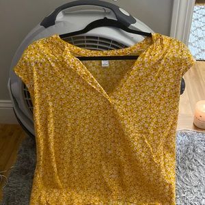 Yellow sleeveless blouse